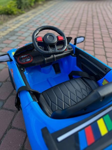 Дитячий спортивний електромобіль кабріолет зі спойлером PRIMA CAR Cabrio 6V 5A (пульт, LED-фари, музика, педаль газу), Синій G539 фото