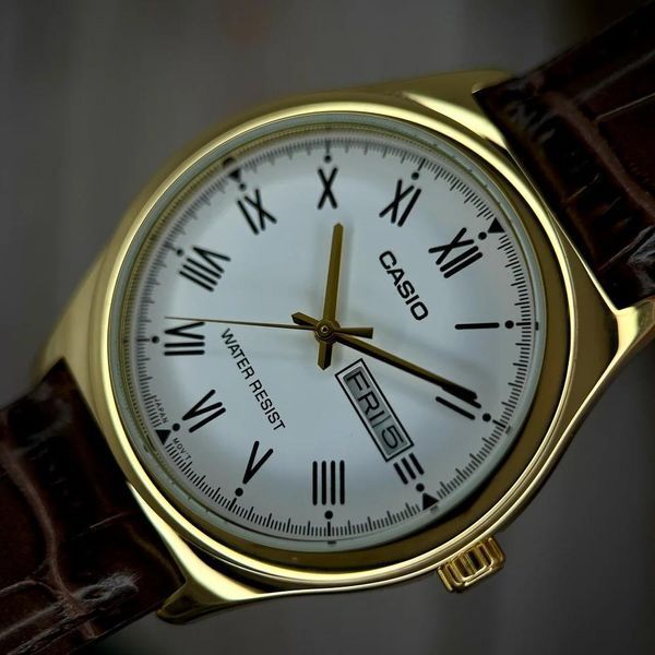 Чоловічий годинник Casio MTP-V006GL-7B Класичний стиль з білим циферблатом та шкіряним ремінцем 1141-0274 фото